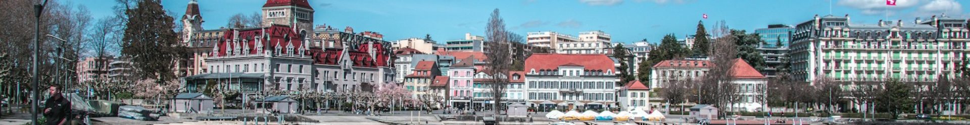 a body of water with a bunch of buildings in the background