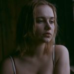 woman wearing white tank top