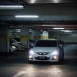 a group of cars parked in a parking garage